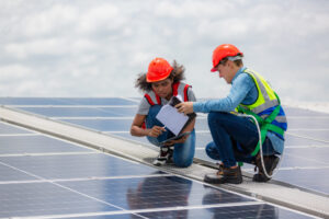 Green environmental energy concept, Technician workers team installing solar photo voltaic panels